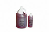 Two bottles of a liquid product on a white background