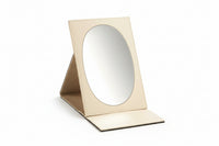 A large oval foldable mirror with a chocolate and beige leatherette frame.