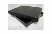 Black cardboard gem tray without inserts, viewed from an angle that shows both the tray and the lid.
