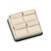 A chocolate and beige leatherette 4 earring stand with a soft, cushioned interior.