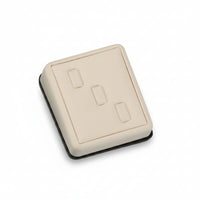 A chocolate and beige leatherette ring stand with three clips