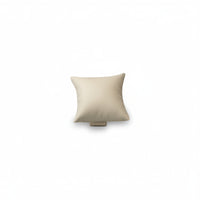 A chocolate and beige leatherette pillow-shaped display case for jewelry.