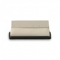 A chocolate and beige leatherette earring stand designed to hold three pairs of earrings.