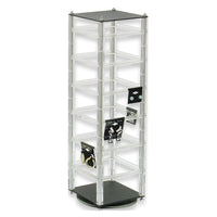 An acrylic rotating hanging earring card display with multiple compartments, mounted on a white base.