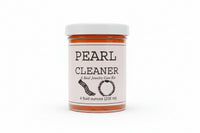 Jar of pearl cleaner on a white background