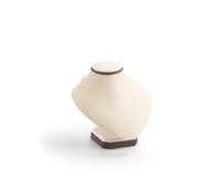 A small neckform with a chocolate and beige leatherette finish, designed to display necklaces.