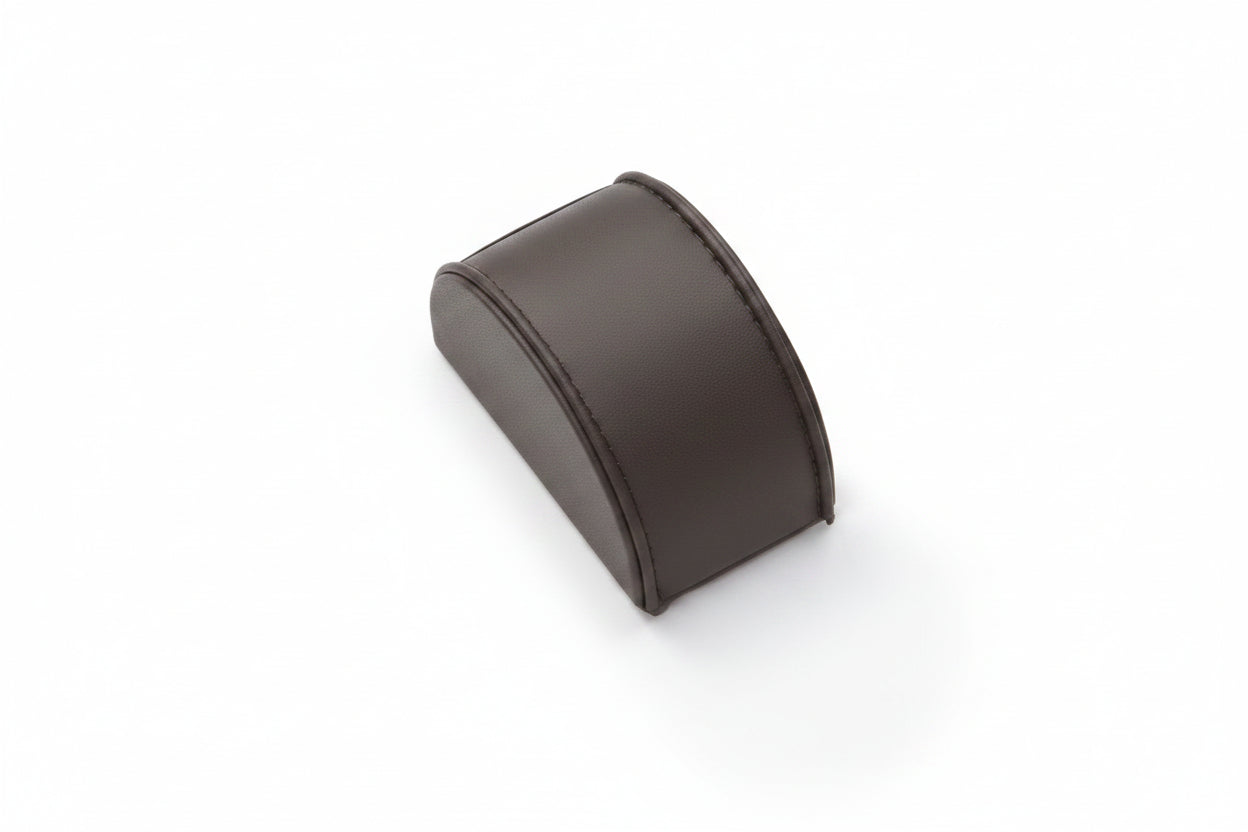 A small bracelet dome with a chocolate leatherette finish.