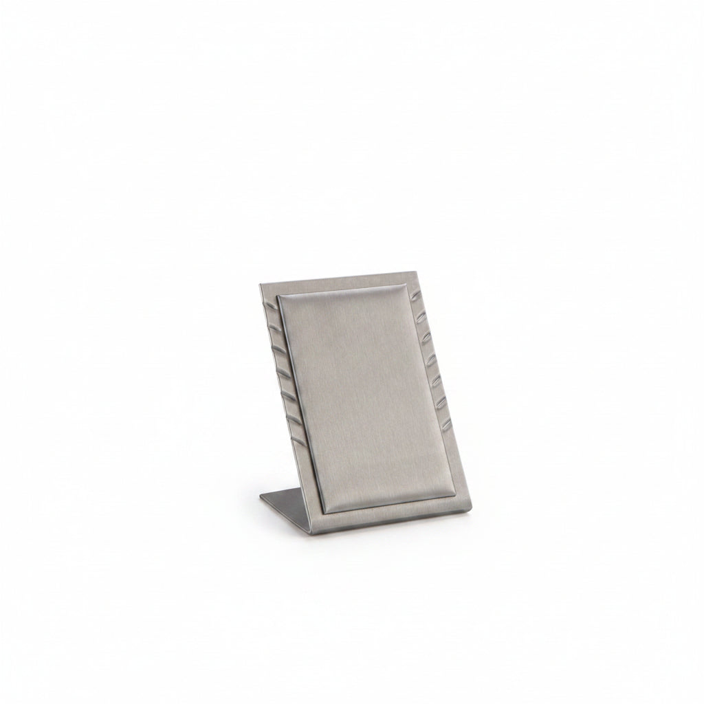A silver gray leatherette stand designed to hold up to seven pendants, with a sleek finish and a soft interior to prevent scratches.