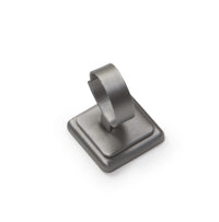 A silver gray leatherette bangle/watch stand with a refined finish, designed to display jewelry items.