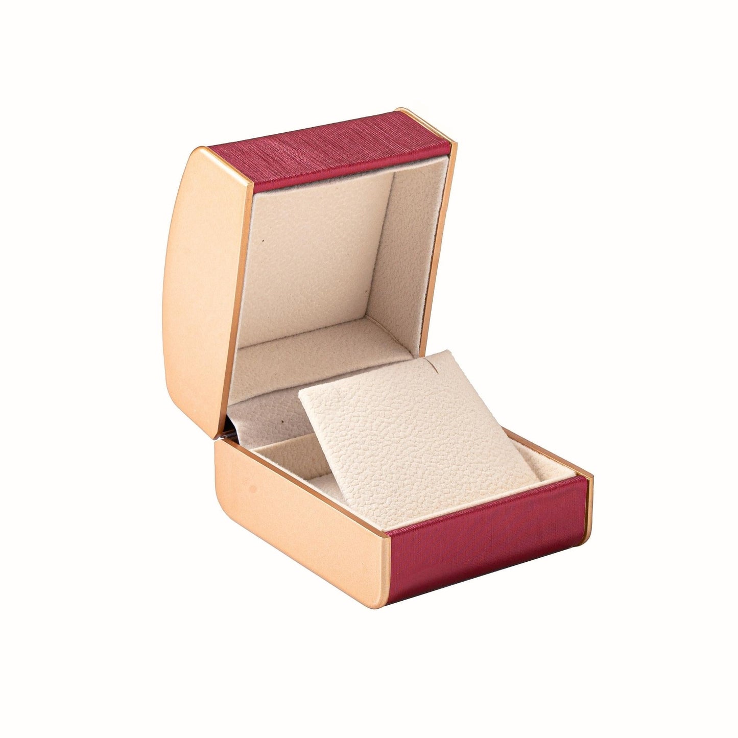 Open jewelry box with red interior and beige interior on a white background