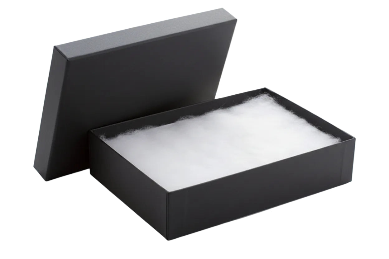 Black box with white cushioning on a white background