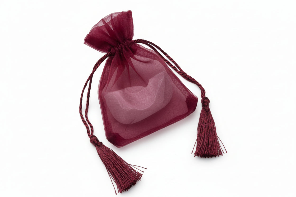 White drawstring bag on a white background