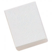 A single white cotton filled jewelry box with a swirl pattern on the lid.
