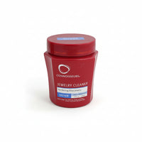 Red container of Connoisseurs Jewelry Cleaner on a white background