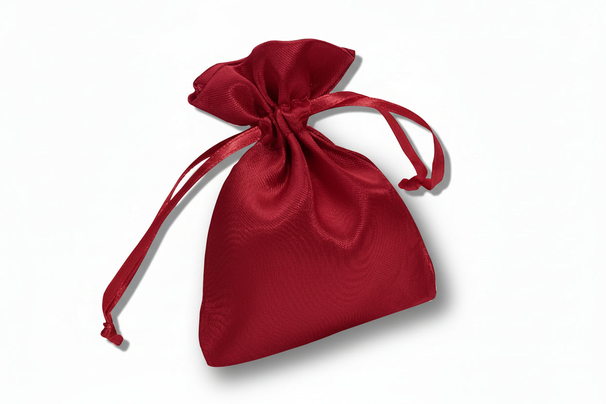 red drawstring pouch on a white background