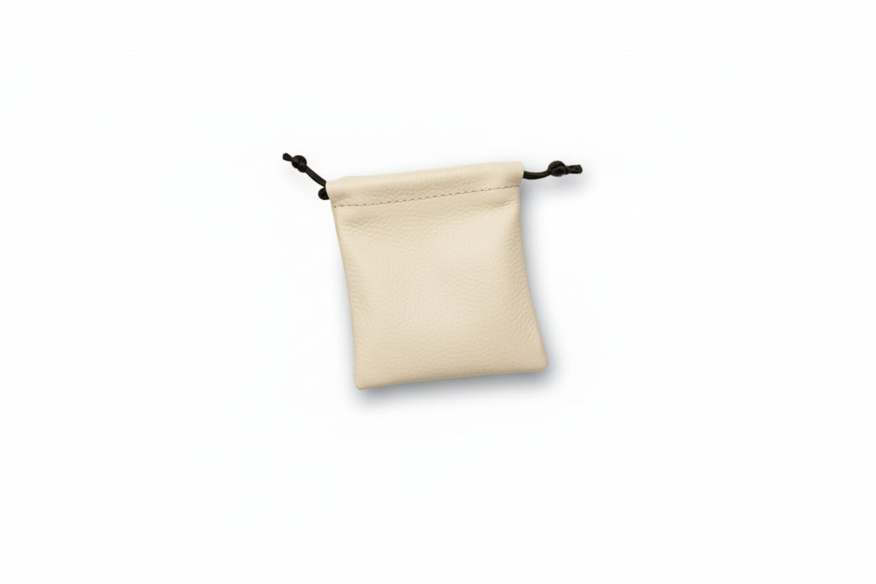 Ivory drawstring pouch on a white background