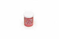 Red jar with white lid on a white background