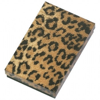 A leopard print cotton filled jewelry box with a closed lid.