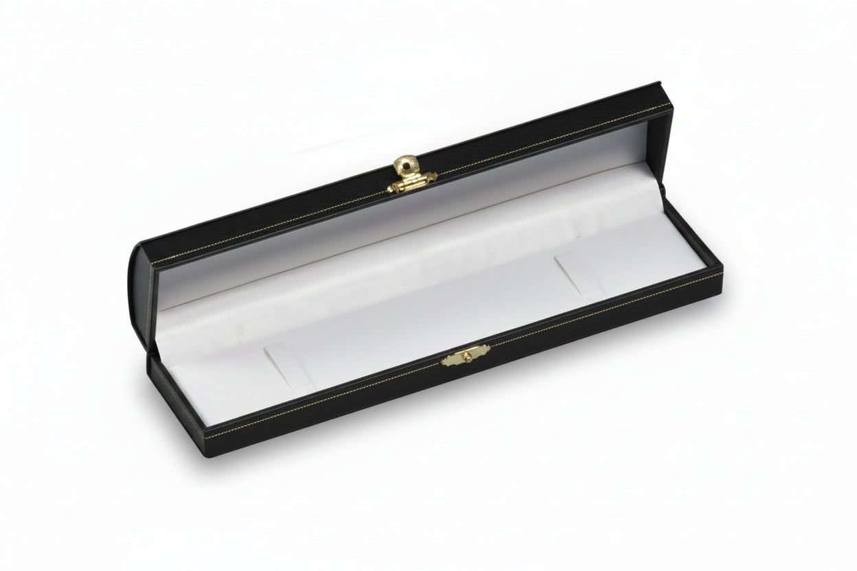 Wooden jewelry box with white interior on a white background