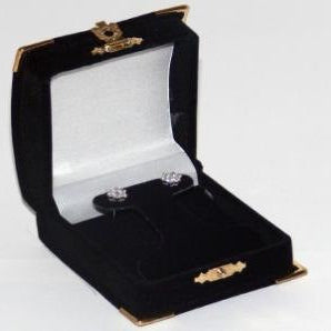 Black velour treasure chest-style earring box that is open, displaying a pair of earrings on a lift-up stand.