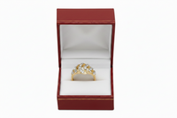 Ring with diamonds in a red jewelry box