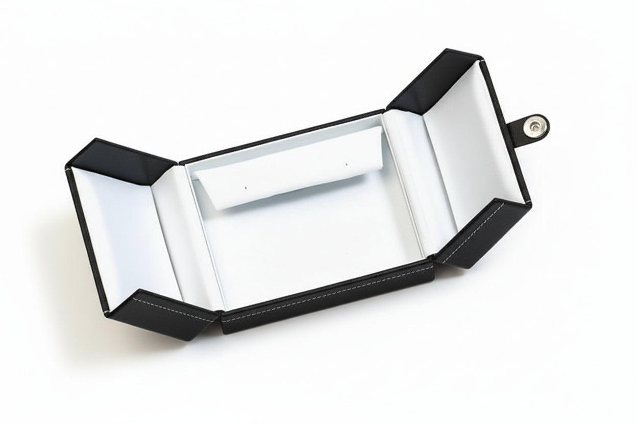 Open black jewelry box 