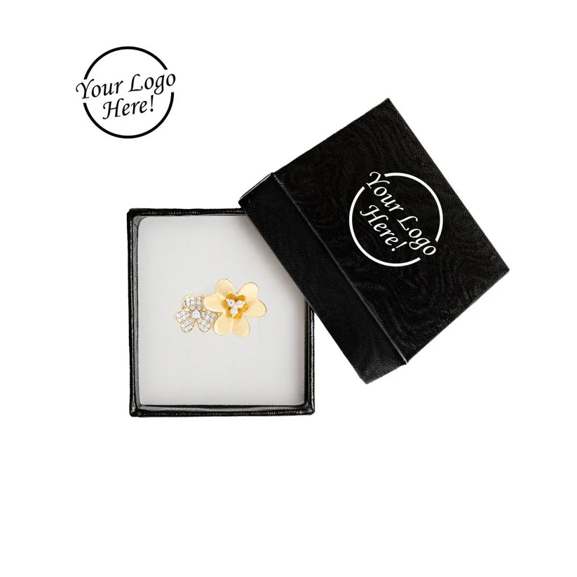 Flower-shaped earring in a black jewelry box with 'Your Logo Here!' text.