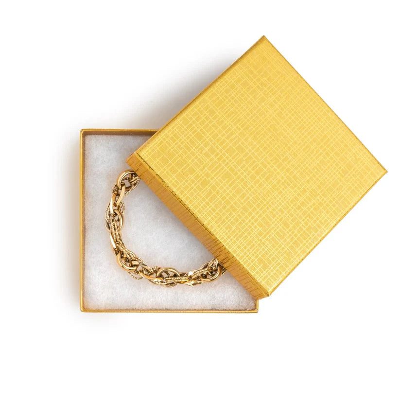 Gold chain bracelet in a box 