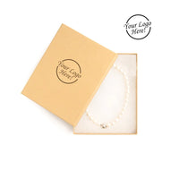 Open kraft colored jewelry box with a necklace inside, featuring 'Your Logo Here!' text.