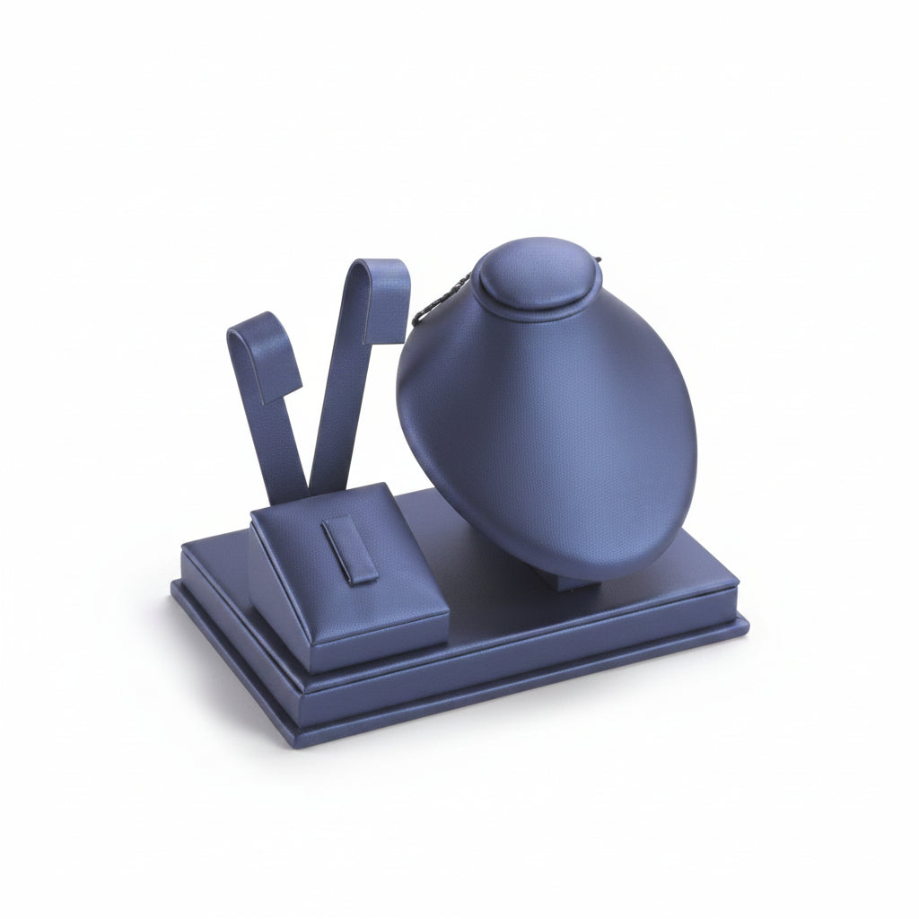Navy blue leatherette stand designed to hold earrings, rings, and pendants upright for display.