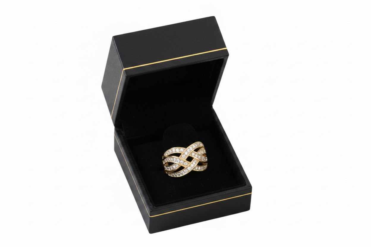 Gold ring in a black jewelry box
