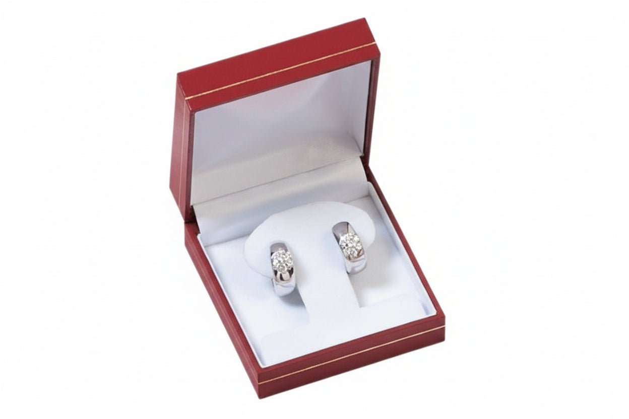 Two rings in a red jewelry box 