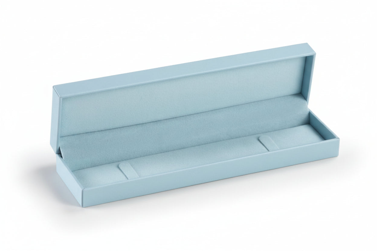 A light blue leatherette bracelet box is open and empty, with a suede interior, displayed on a neutral background.
