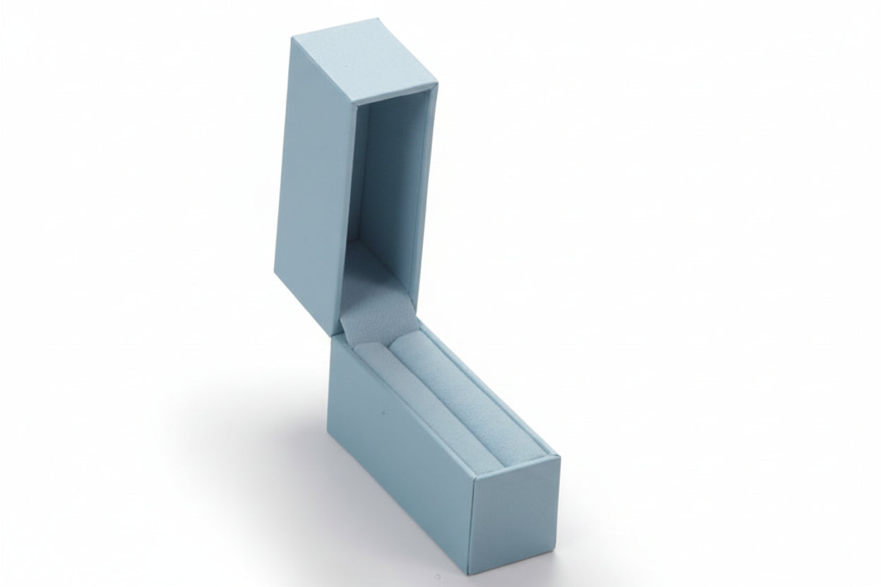 A light blue leatherette bangle box opened to show the interior compartment.