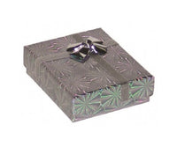 Assorted Colors Shiny cardboard wide pendant box with a metallic accent bow on top, displaying a geometric pattern finish.