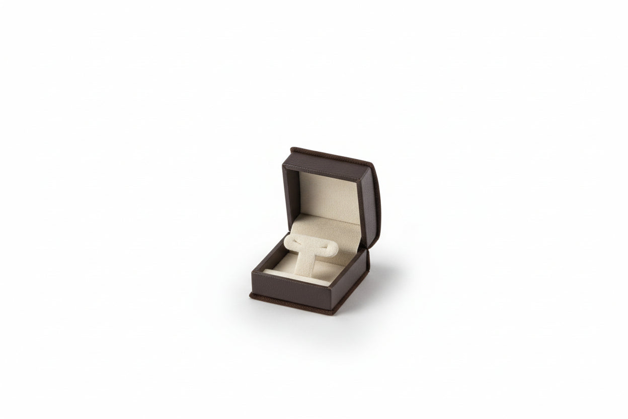 A small Chocolate leatherette  jewelry box 