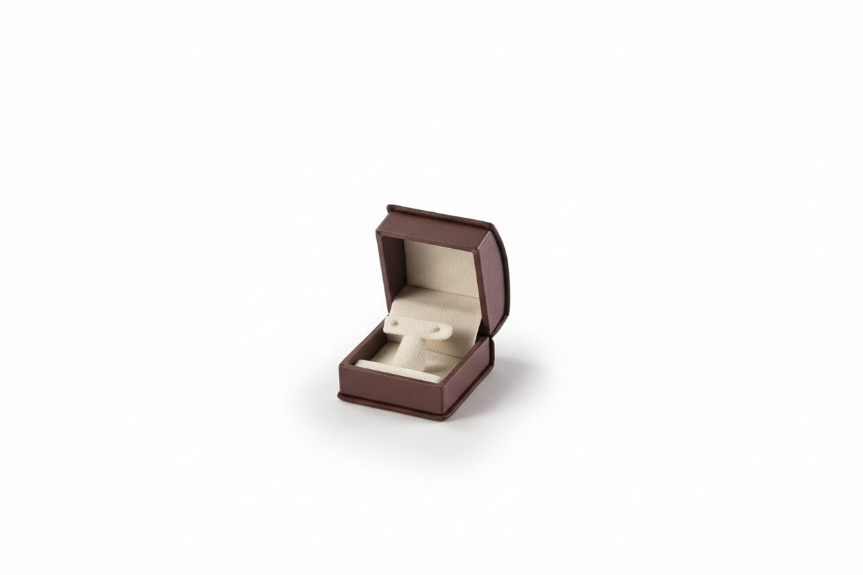 A small Burgundy leatherette jewelry box