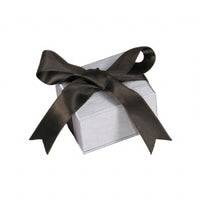 A steel grey gift box with a satin ribbon bow on top.