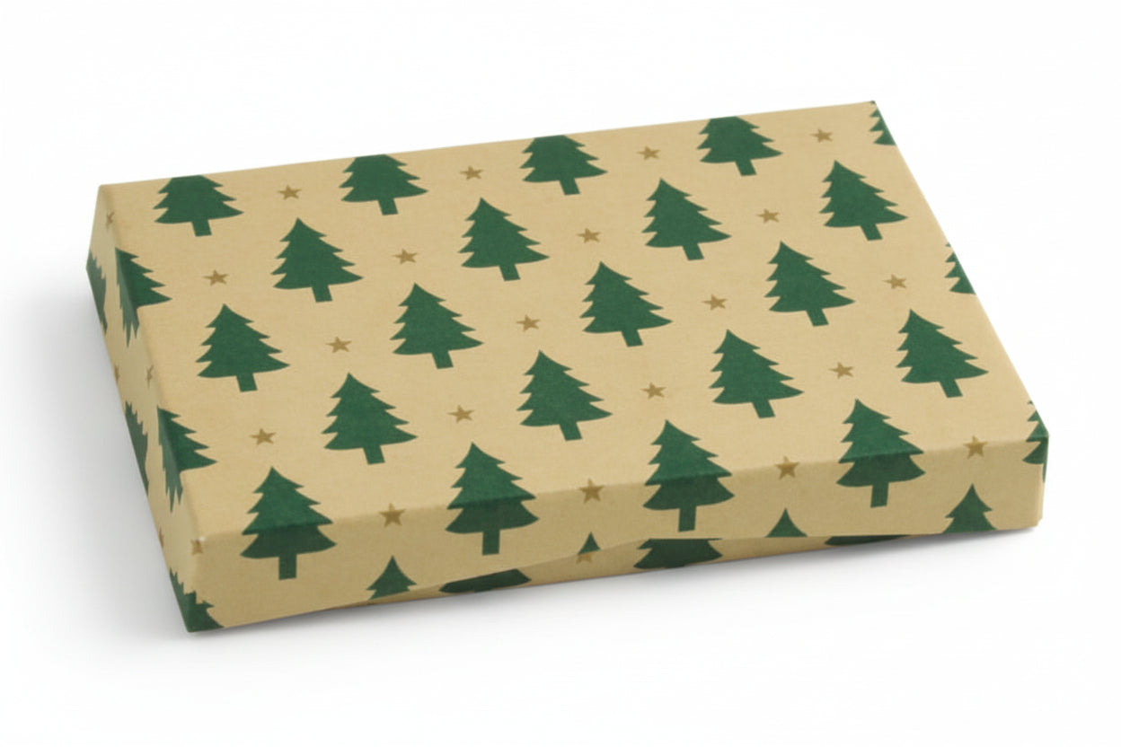 A rectangular gift card box with a kraft paper design featuring green tree illustrations and stars, with a white interior.
